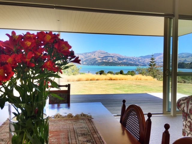 L'abri dining room looking over Akaroa Harbour